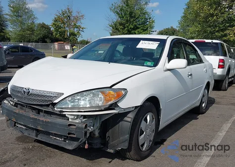 2002 Toyota Camry Le from USA, damaged, VIN 4T1BE32K62U063797